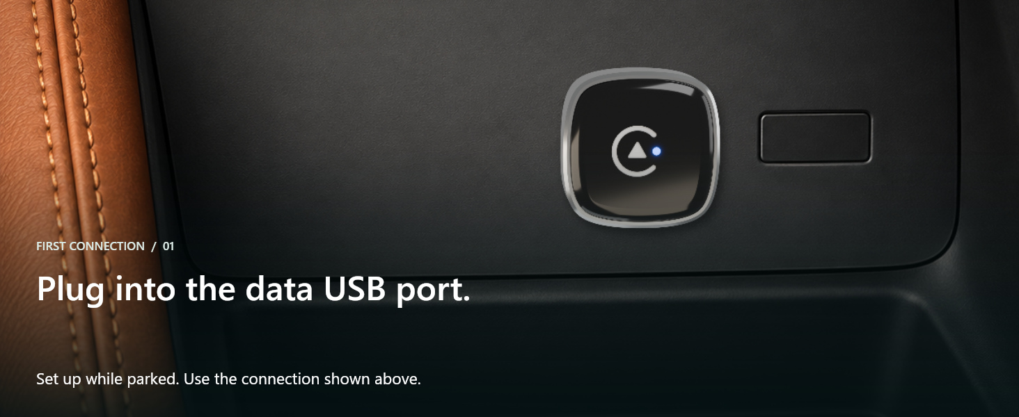 Adapter inserted into a vehicle data USB port.