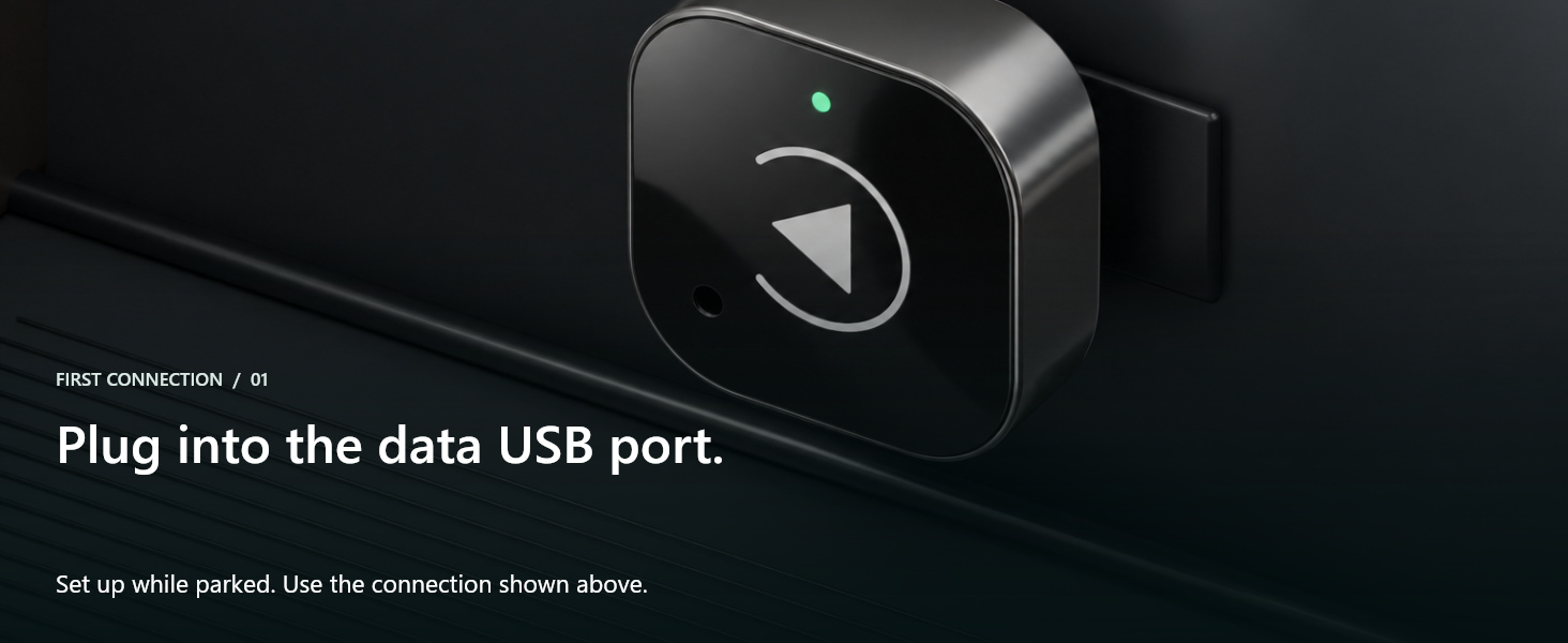 Adapter inserted into a vehicle data USB port.