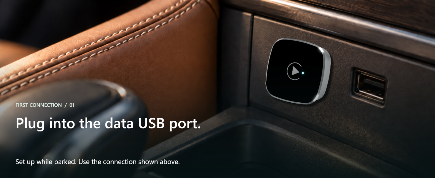 Adapter inserted into a vehicle data USB port.